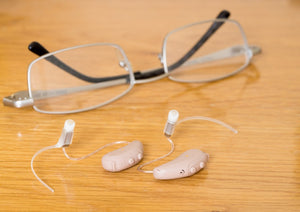 Wearing Hearing Aids and Glasses -  Common Problems and Some Solutions