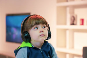 child listening to headphones without kids ear protection