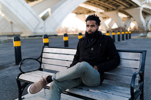 man sitting on bench