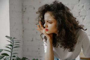 young woman looking confused 