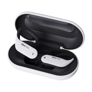 Olive Max wireless hearing aids with active noise cancellation and long-lasting battery life. The hearing aids rest in a sleek, portable charging case