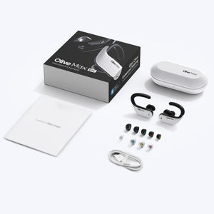 A close-up photo of the contents of the Olive Max hearing aids box, including the hearing aids, charging case, and user manual